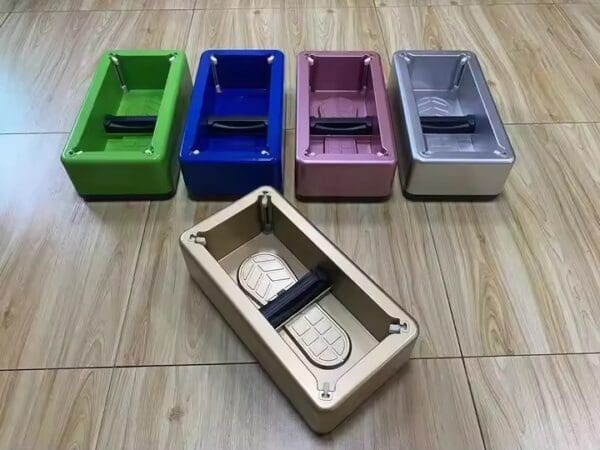 A group of different colored boxes with remote controls in them.